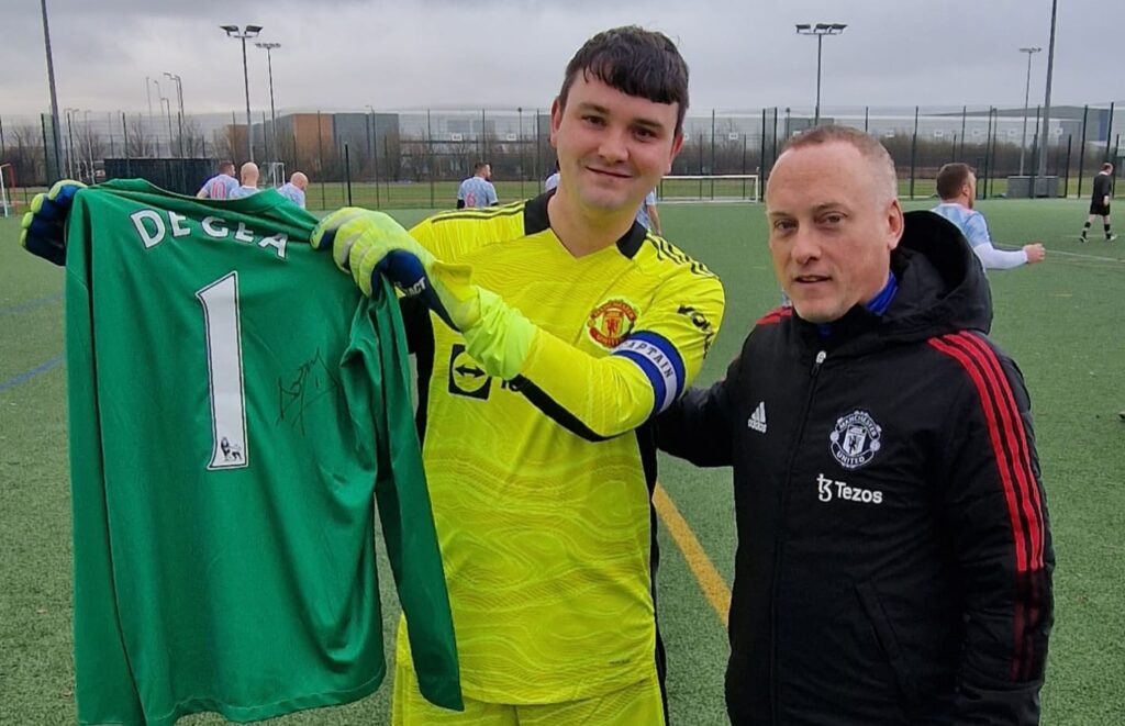 Ric Ashworth-Lord was presented with a signed David De Gea shirt